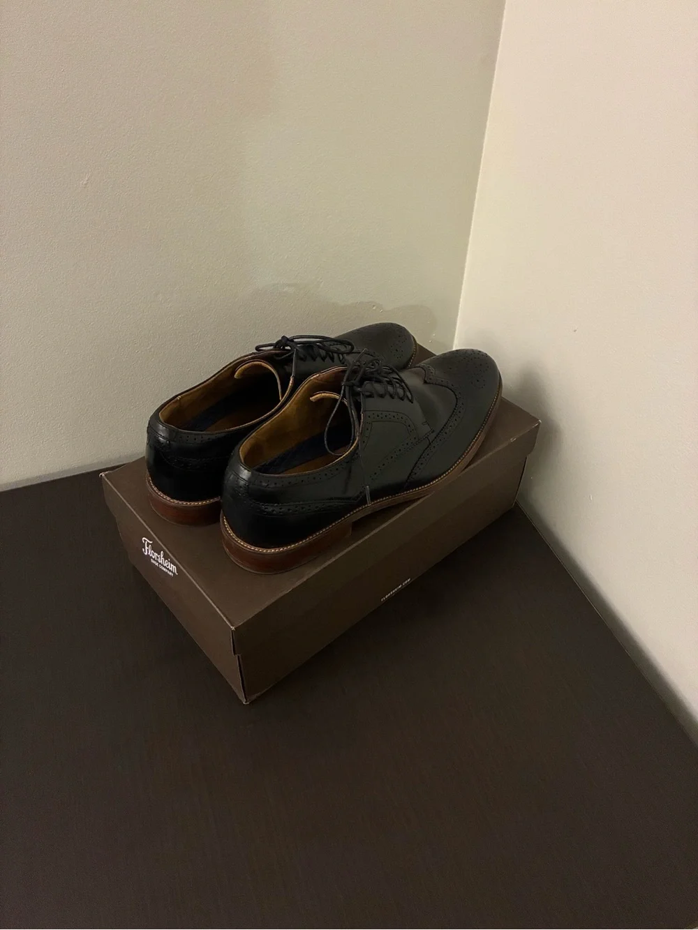 Florsheim Black Leather Wingtip Oxfords with Brown Sole Trim